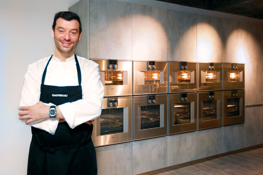 Chef Fantin with the Gaggenau combi-steam oven (Photo by Carol Chan)